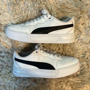Puma brand size 6 white sneakers with black puma logo